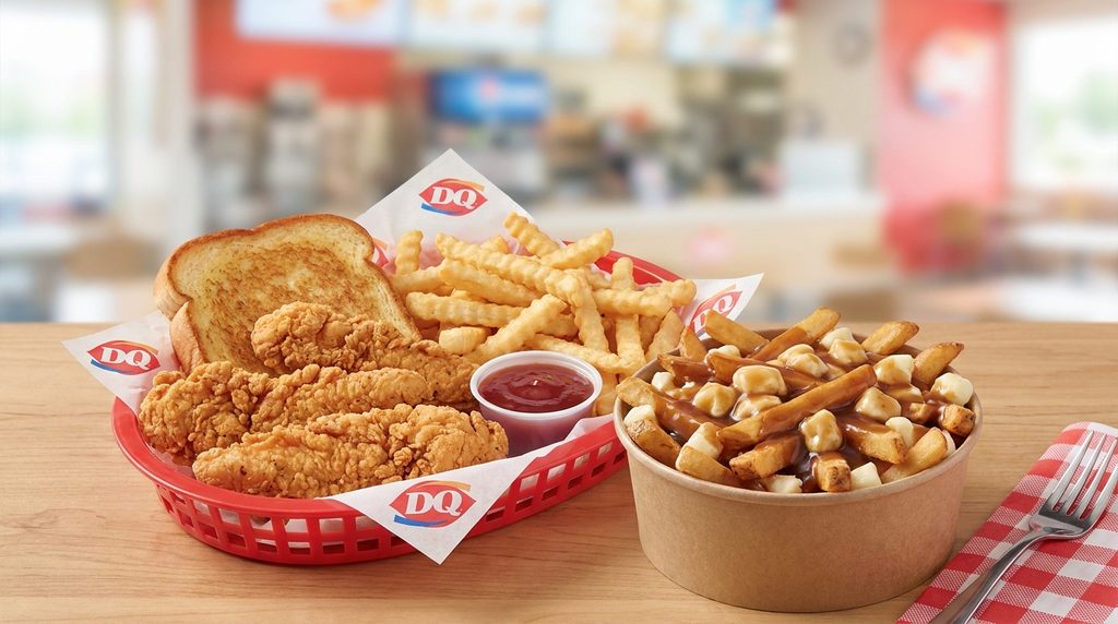 Dairy Queen 4-piece crispy chicken strip basket served with Texas toast, French fries, plum dipping sauce, and Canadian poutine
